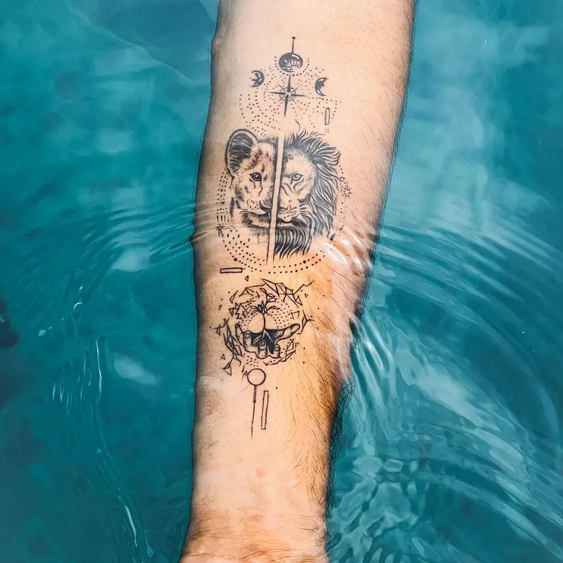 Small detailed lion tattoo in micro-realism on a forearm